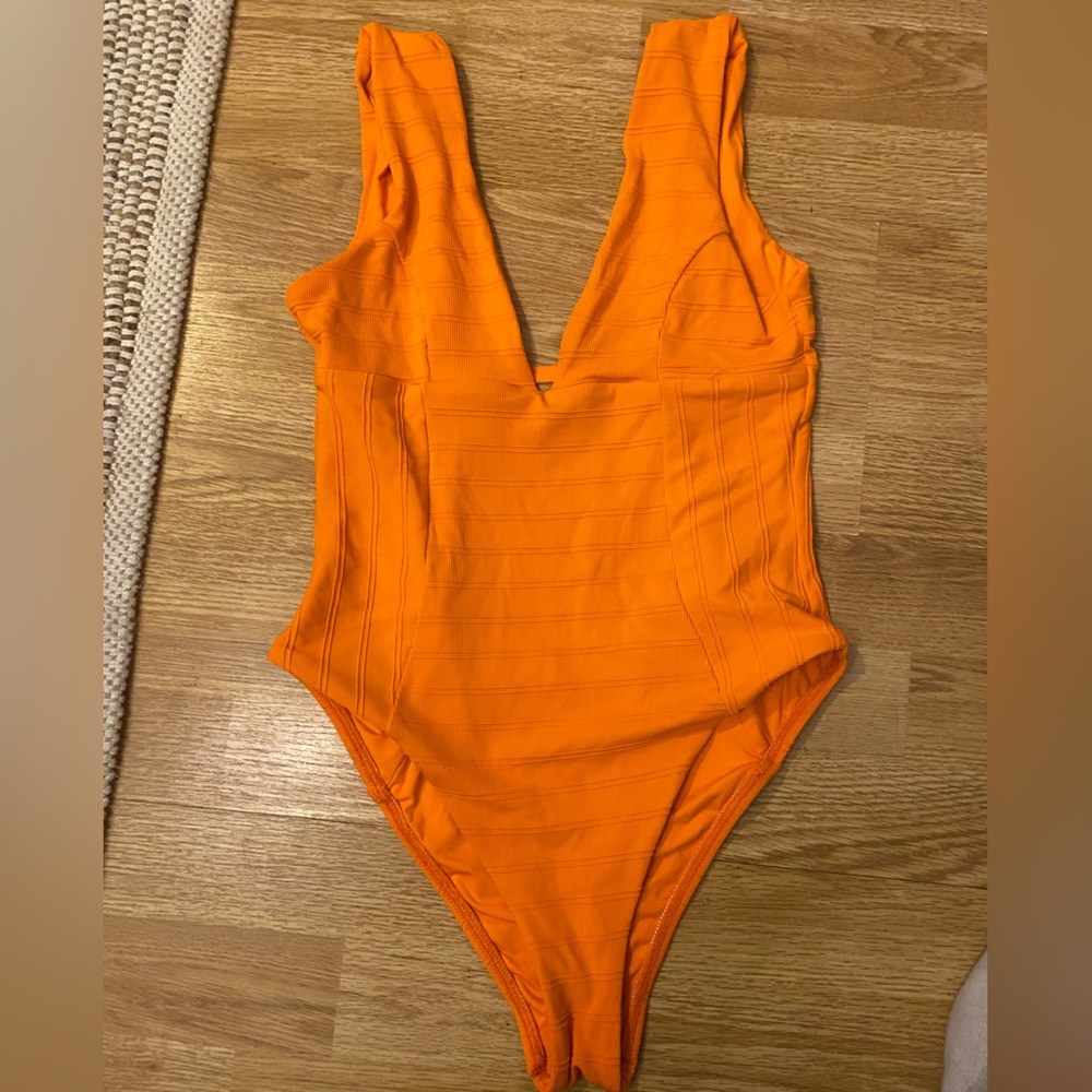 Like new l space one piece